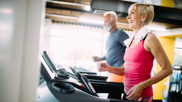 Two seniors working out in the Hidden Springs Fitness Center