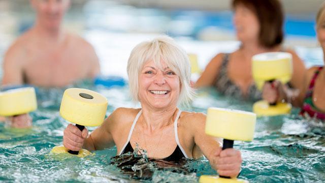 A women enjoying the pool at Hidden Spring of McKinney